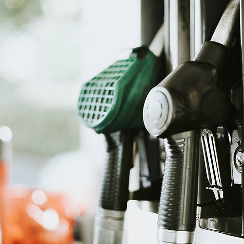 Closeup of fuel nozzles at a gas station